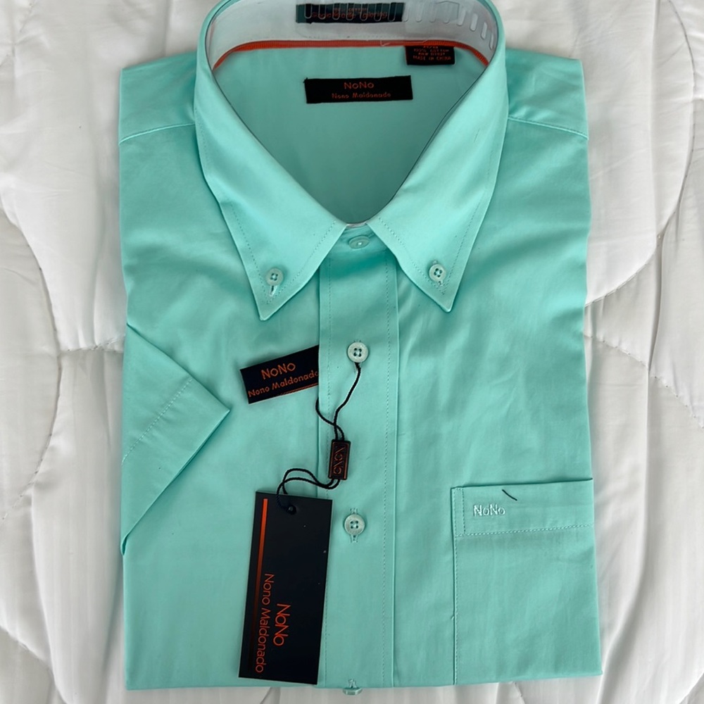If the designer is Nono Maldonado, it is medium size and Aqua color.